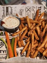 Crispy Buffalo Wings and French Fries
